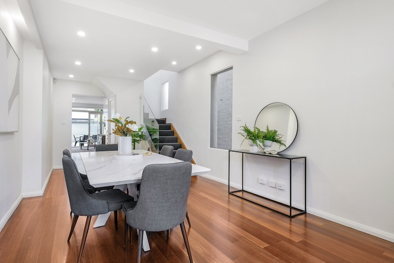 Experience a stunning transformation with our elegant dining room renovation, part of Dura Group's exceptional home improvement services. Located in Sydney, our family-owned company excels in creating beautiful, functional spaces with a homeowner-first approach. Our skilled team integrates modern design elements with a focus on time efficiency and budget-conscious planning. Specializing in home renovations across Sutherland Shire, Bayside, Inner West, Georges River, and Randwick, we ensure every project reflects quality craftsmanship and tailored building solutions. Picture your perfect dining area, complete with sleek, contemporary furniture and ambient lighting, all brought to life without compromising on your budget or timeline. Trust and transparency are at the core of Dura Group's values, ensuring you are always informed and engaged throughout the renovation process. Whether you&rsquo;re looking for ground floor extensions or upper storey additions, our expertise spans kitchen upgrades to bathroom remodels. Contact Dura Group today to discuss your next project and turn your unique vision into reality. Let us transform your home elegantly and efficiently, delivering stunning results every time. Discover the Dura difference. Call us now to get started on your dream home renovation!